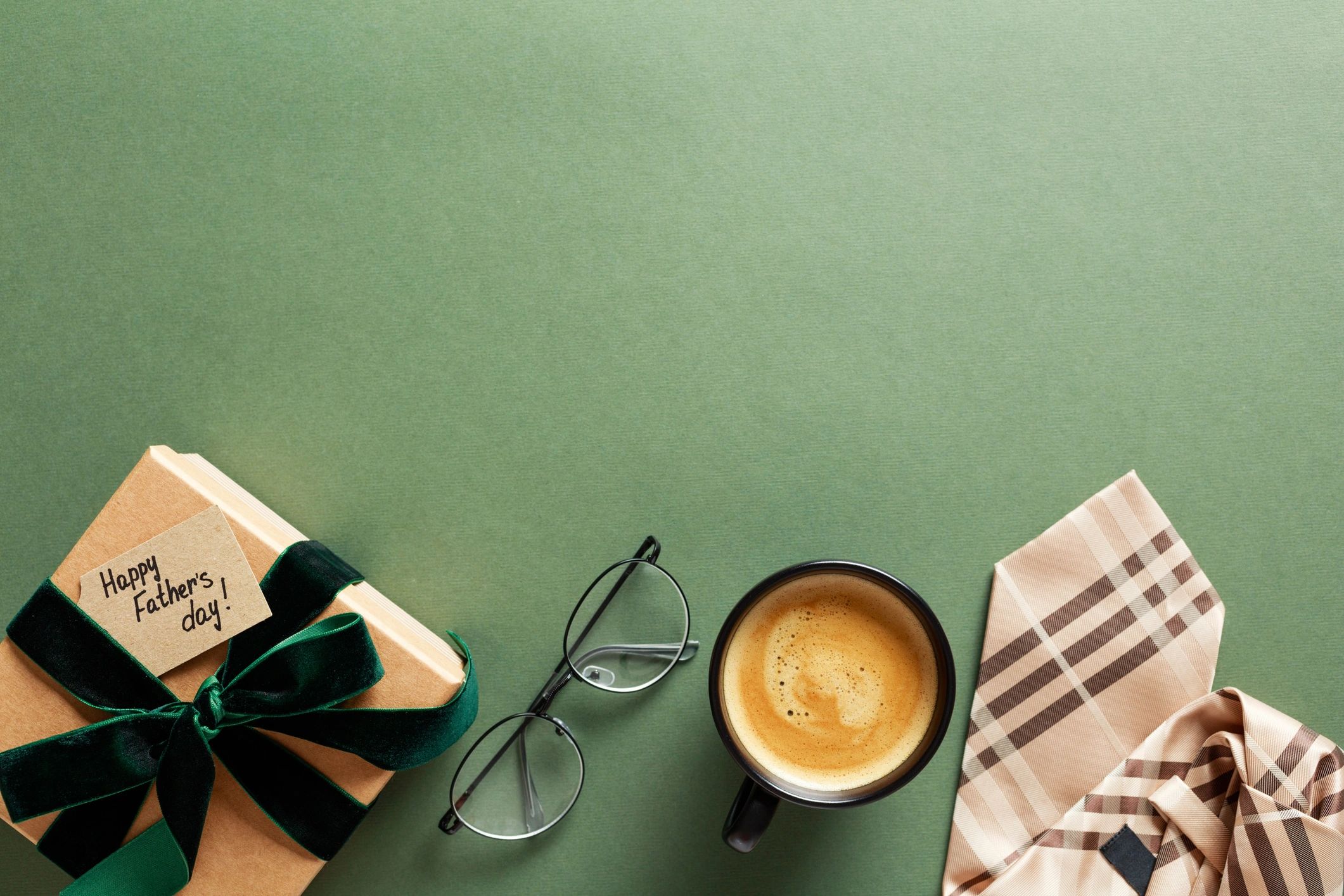 Vintage-style coffee flat lay on green table